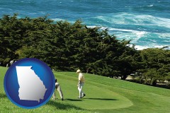 georgia map icon and two golfers on the green at an oceanside golf course