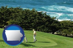 iowa map icon and two golfers on the green at an oceanside golf course