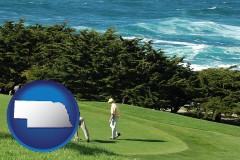 nebraska map icon and two golfers on the green at an oceanside golf course