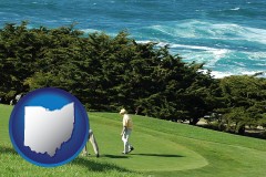 ohio map icon and two golfers on the green at an oceanside golf course