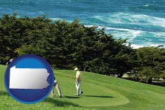 pennsylvania map icon and two golfers on the green at an oceanside golf course