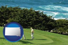 south-dakota map icon and two golfers on the green at an oceanside golf course