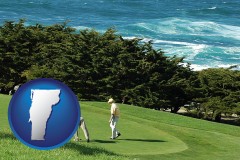 vermont map icon and two golfers on the green at an oceanside golf course